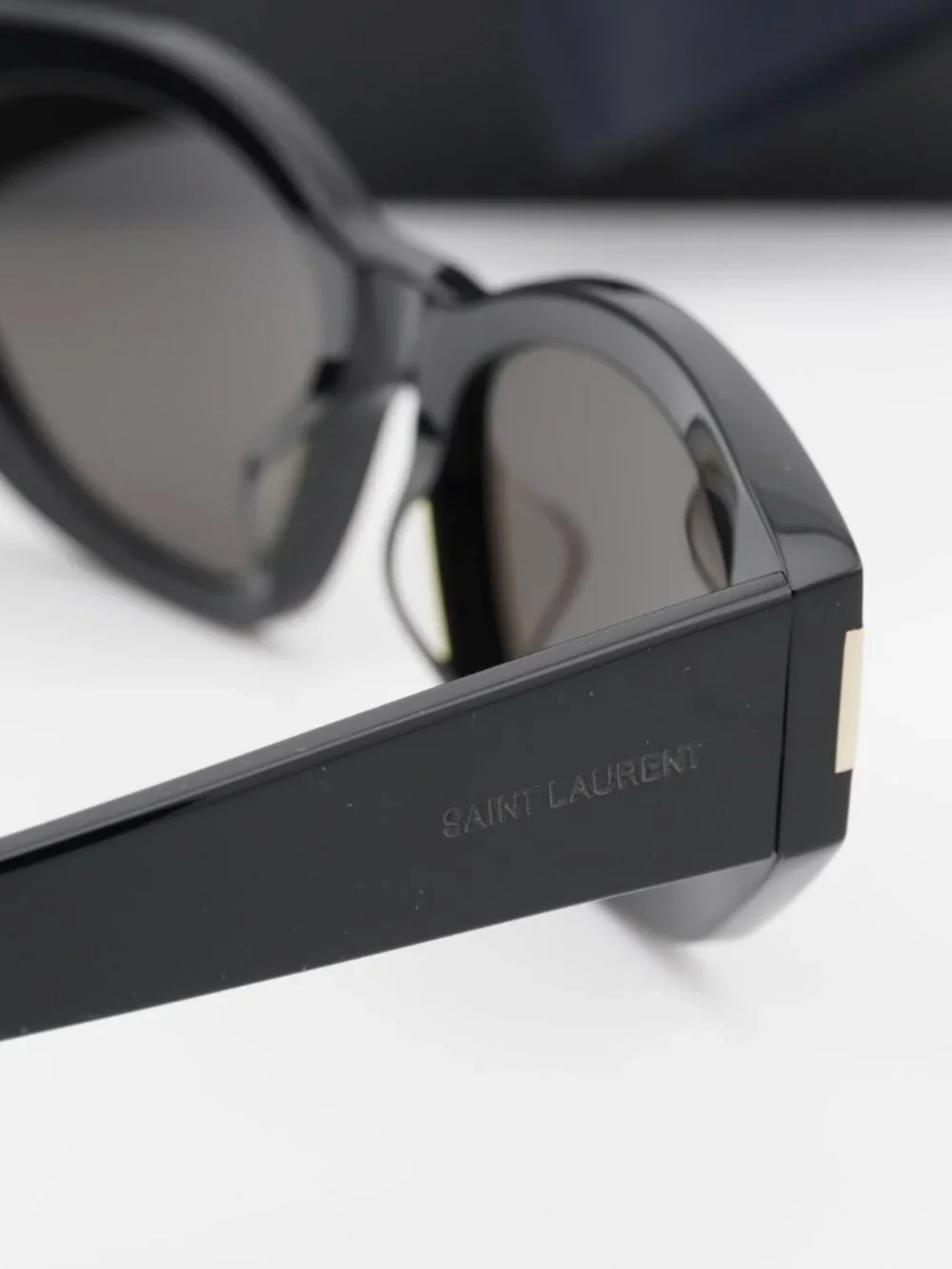 Saint Laurent SL638 001 Oval Sunglasses - Black / Black